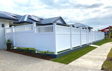 Mary PVC fence gallery curved frontage with custom entry pergola by Queensland Fencing Specialists