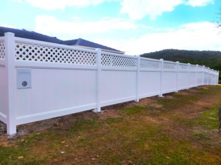 Bertha lattice-top privacy fence gallery with letterbox panel on a side boundary by Queensland Fencing Specialists