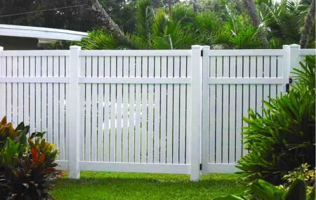 Caroline PVC fence gallery panel design in a tropical garden by Queensland Fencing Specialists