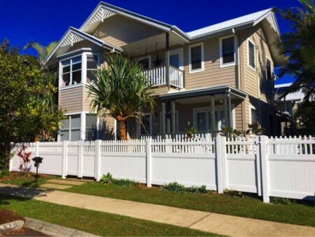 Eleanor picket-top privacy fence gallery along a Queensland streetscape by Queensland Fencing Specialists