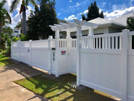 Mary PVC fence gallery front boundary with decorative entry feature by Queensland Fencing Specialists