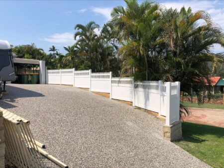 Eleanor picket-top privacy fence gallery on a sloped Queensland driveway by Queensland Fencing Specialists