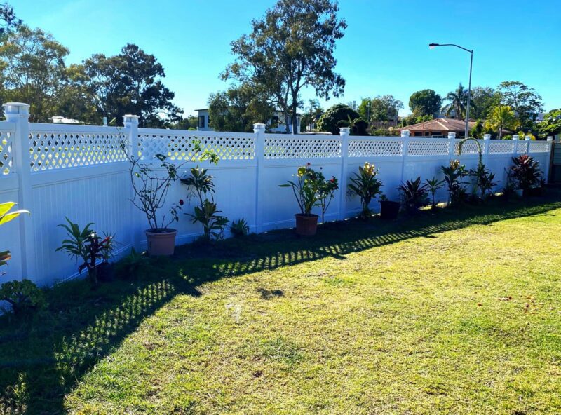 Bertha lattice-top privacy fence gallery across a wide residential backyard by Queensland Fencing Specialists